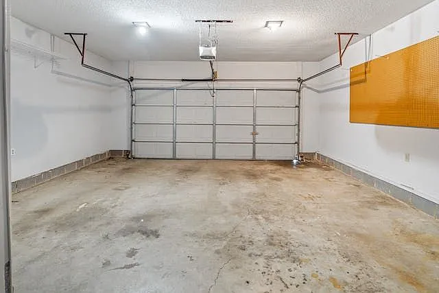 Attached garage is extra large with lots of storage opportunity