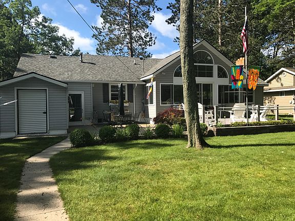 Lake Side of home with deck 