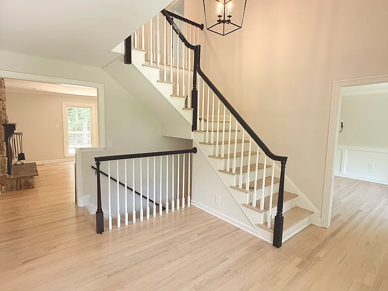 Entryway looking into dining and family room from office