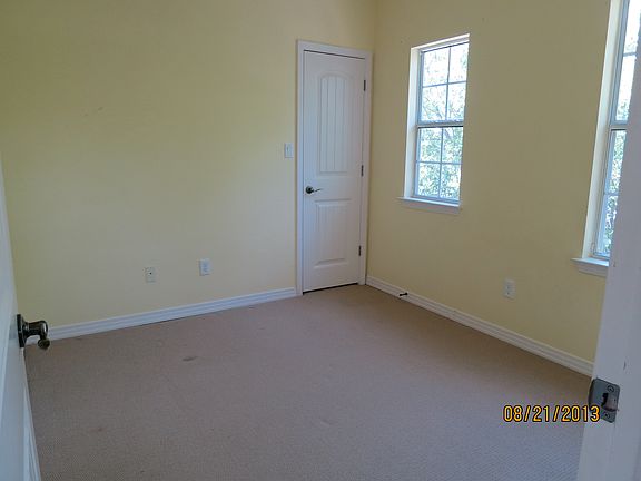 Sunny bedroom with closet