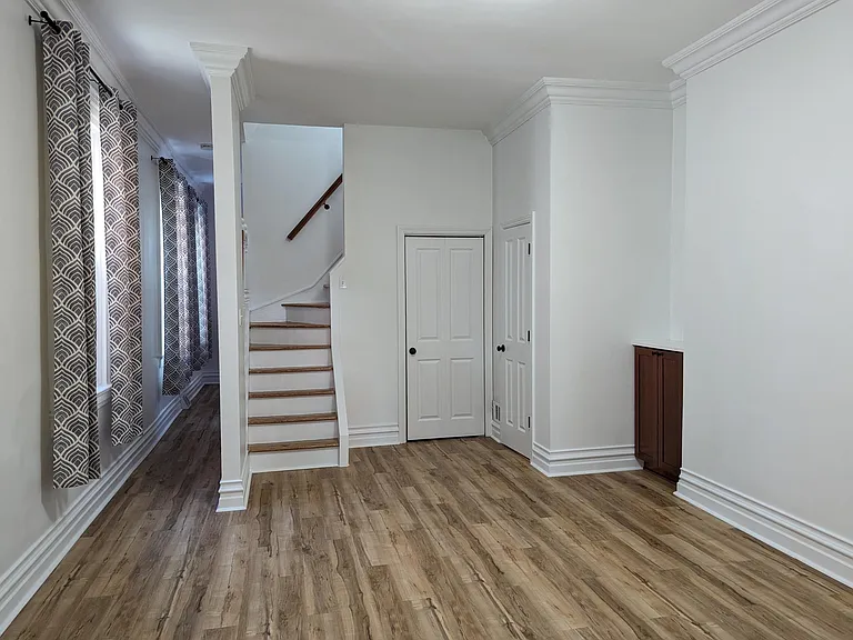 Dining Room - Left most door - Laundry, Right door - half bath