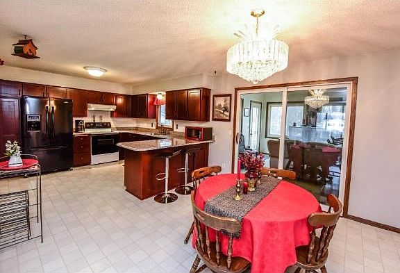 5th image of 8217 Quebec Ct N