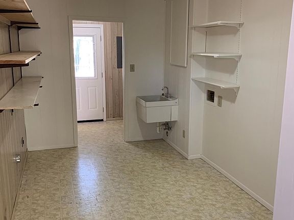 laundry room with sink