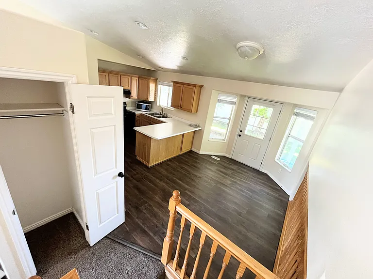 Notice the hallway coat closet conveniently located and accessible.