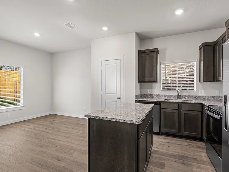 The dining room sits right off of the kitchen.