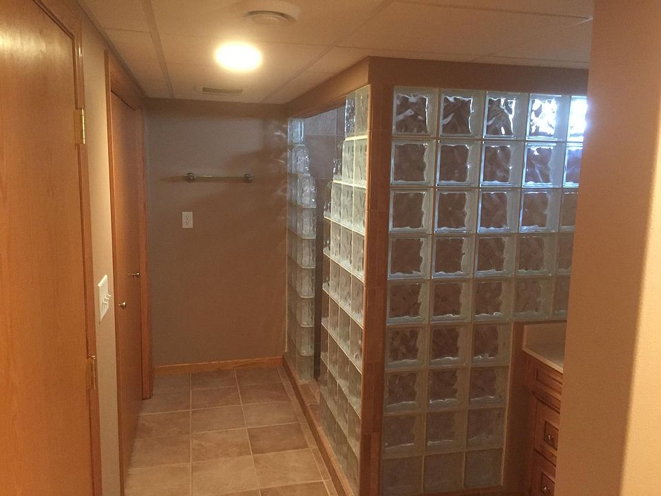 Large lower level bath with huge shower & closet
