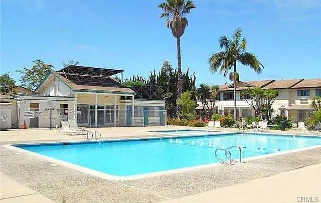 Association Pool. Close enough for convenience but there is a very large greenbelt and covered picnic area between your home and the pool.