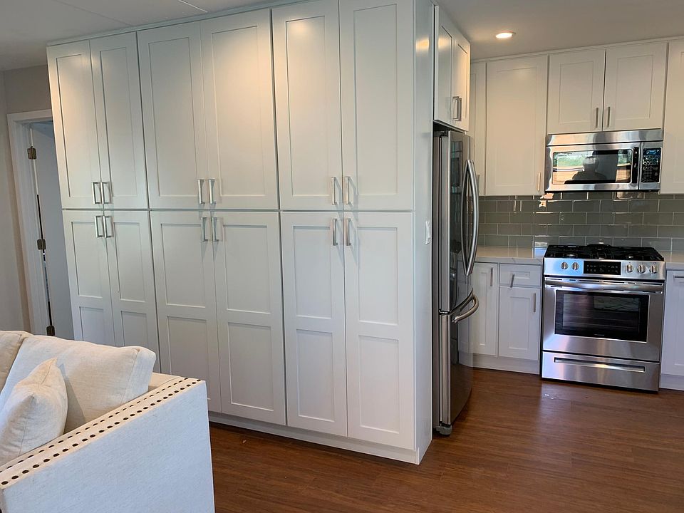 A wall of cabinets provides more so much storage!