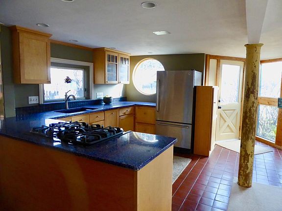 sunny kitchen gas stove and modern appliances