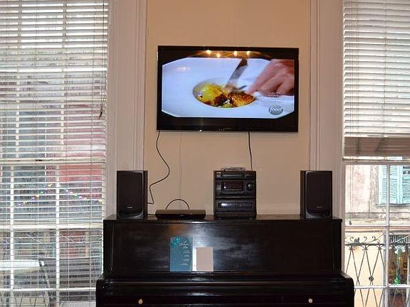 smart TV, piano and stereo system