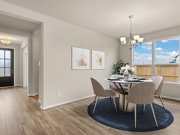 Formal dining room. Note Sample product photo - actual exterior and interior selections may vary by