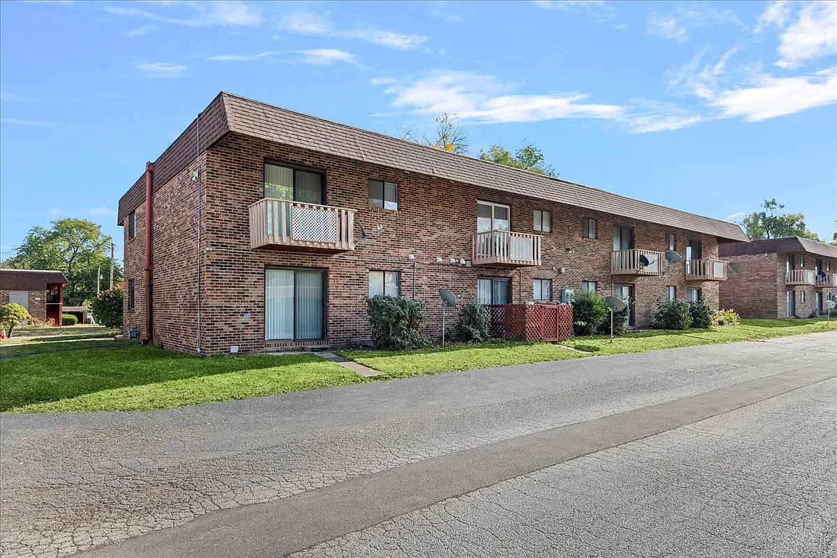 Village Apartments — Photo 3