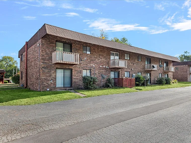 Village Apartments — Photo 3