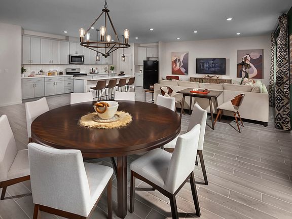 Residence 2 dining room modeled at a nearby Meritage community.