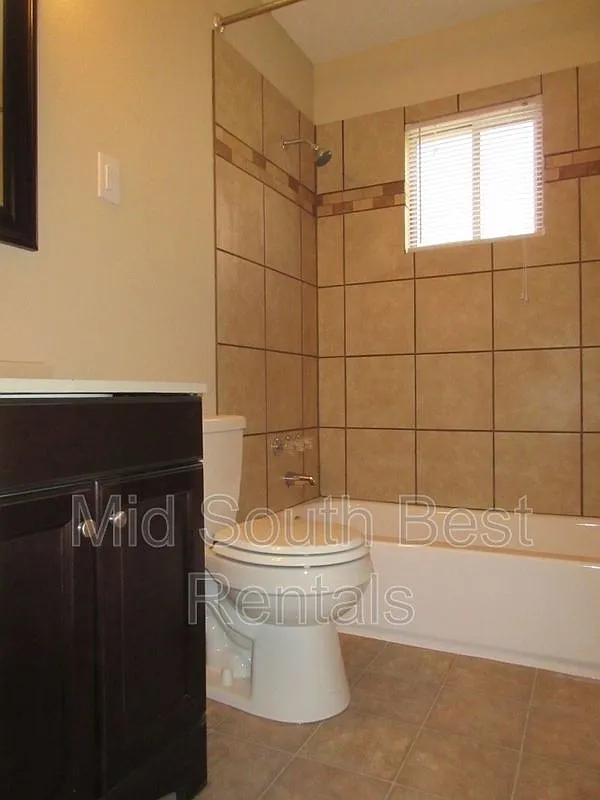 3636 Faxon Ave — Photo 3