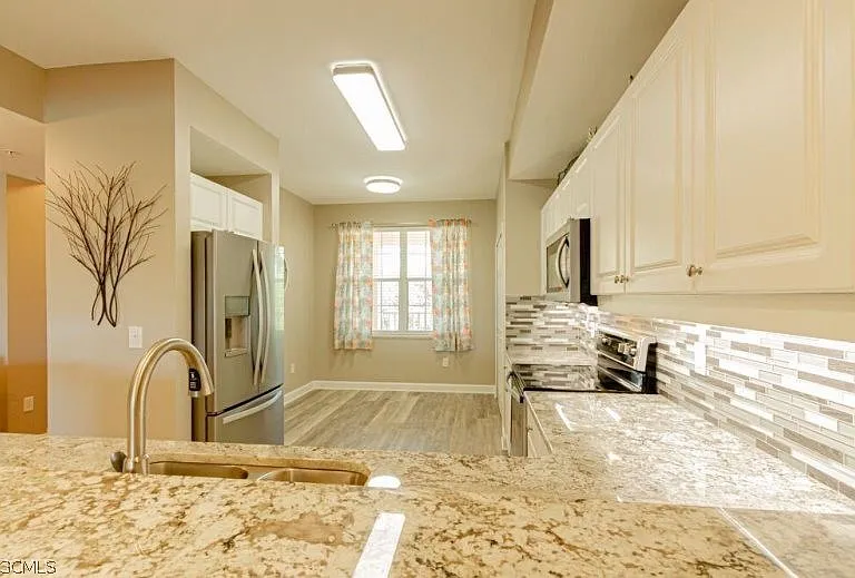 10700 Ravenna Way #303 — Photo 9