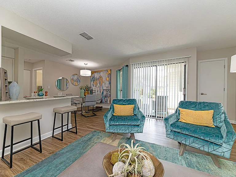Spacious living room with hardwood-style flooring