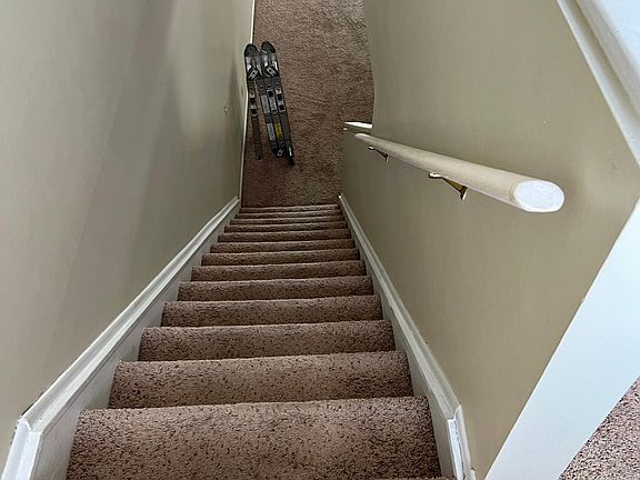 Staircase from bedrooms to living room