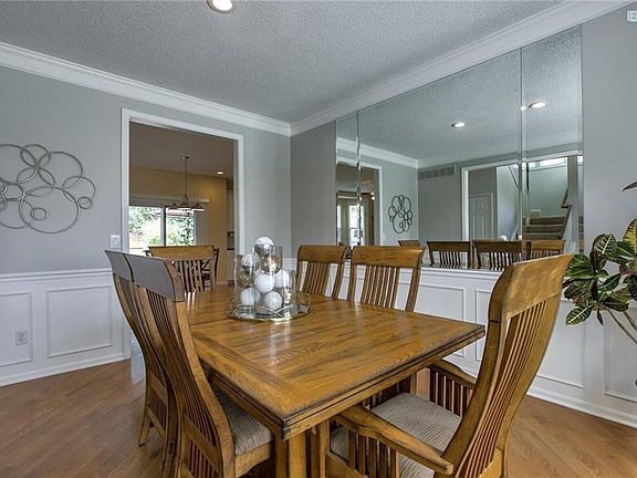 Freshly Painted Dining Room w/Gorgeous Hardwoods!