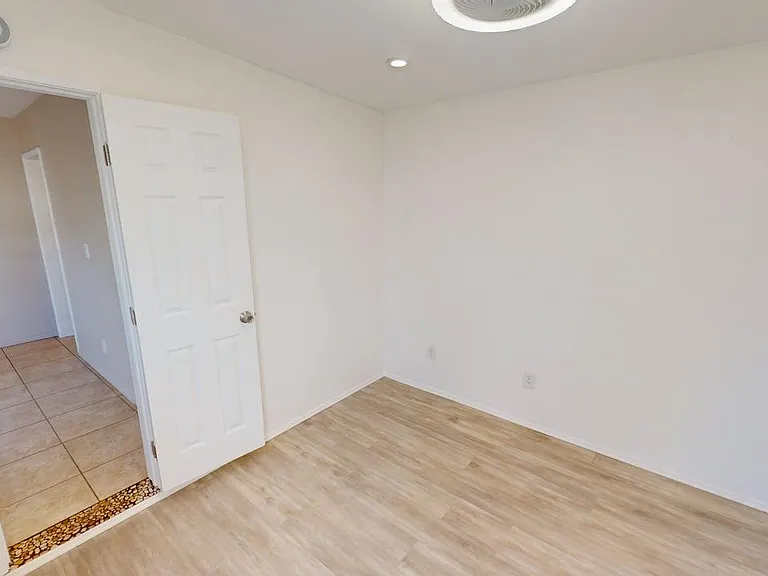 2nd room showing door to living room
