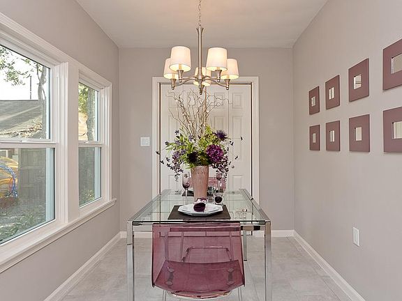 Utility area is located behind the french doors.