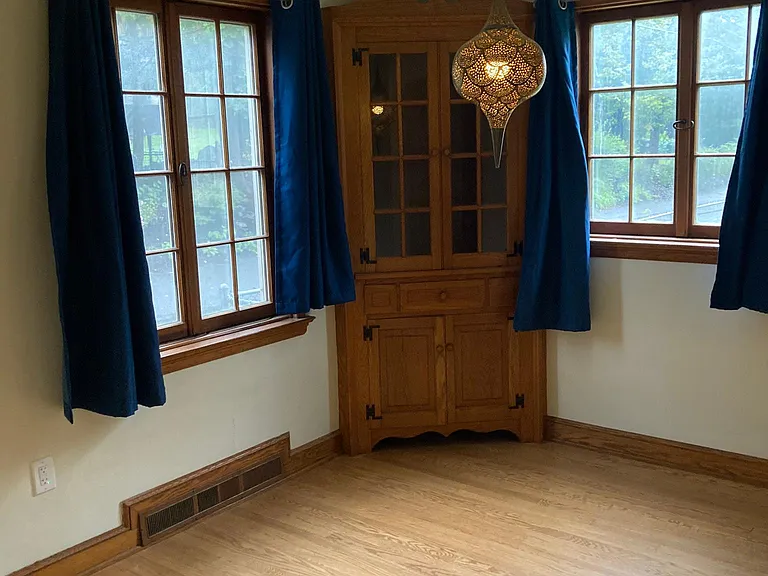 DINING ROOM WITH CORNER CABINET