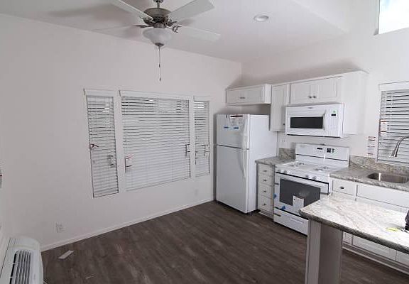 Kitchen area- includes stove, microwave, & referigerator