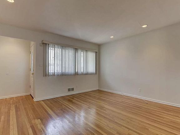 large living room, hardwood floors, natural light