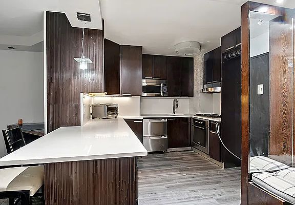 2nd image of 5700 Arlington Ave APT 2M