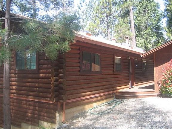BACK OF HOUSE FROM DRIVEWAY