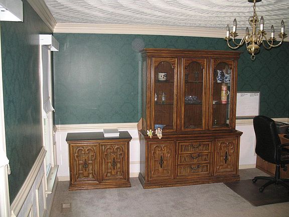 Formal Dining Room has Beautifully decorated ceiling (5th wall) w/chandelier. 