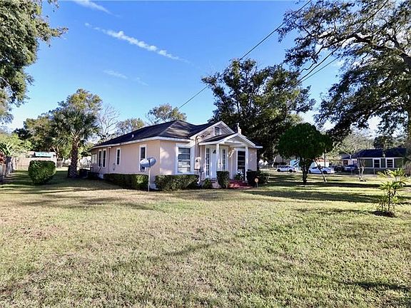 Southwest corner of the Lot closest to the street entrance.