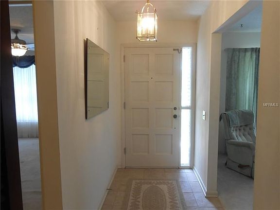 Front entry door with formal living room and bedroom #1, on either side.