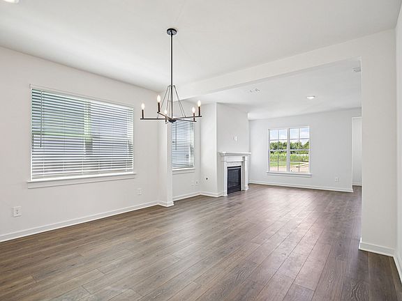 The open-concept floorplan allows for an easy flow between the kitchen and dining areas.