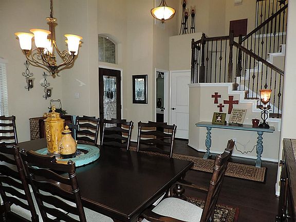 Private half bath and coat closet are to the left of the front door.