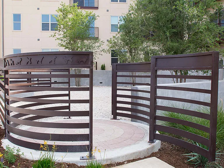 Apartment community off-leash dog park at Griffis at The Domain in Austin, Texas.