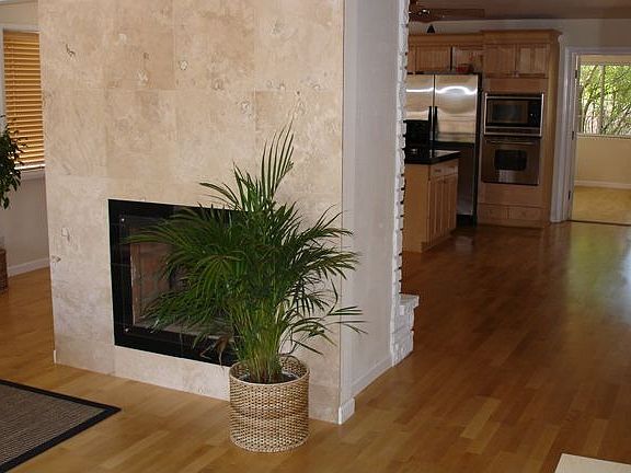 Remodeled open living area & 2-way fireplace