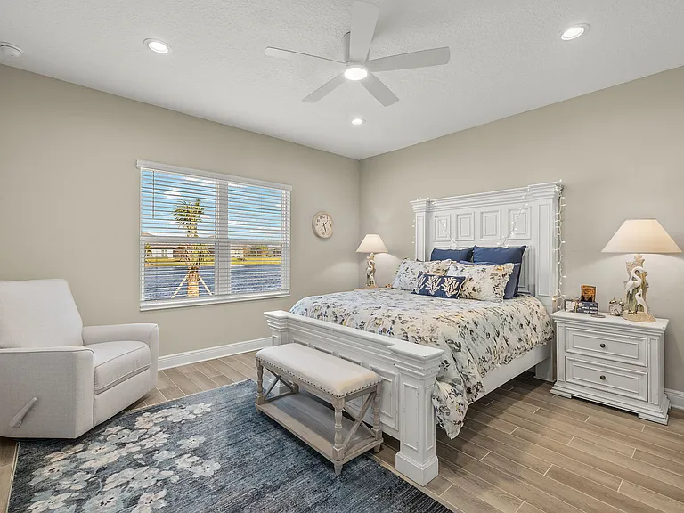 Beautiful Primary Bedroom with lake view.