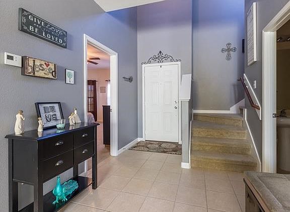 New paint throughout... front entrance is grand with Master bedroom on the left side (in pic) and 1/