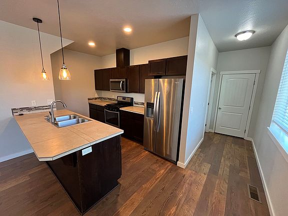 5th image of 63159 NE De Haviland St