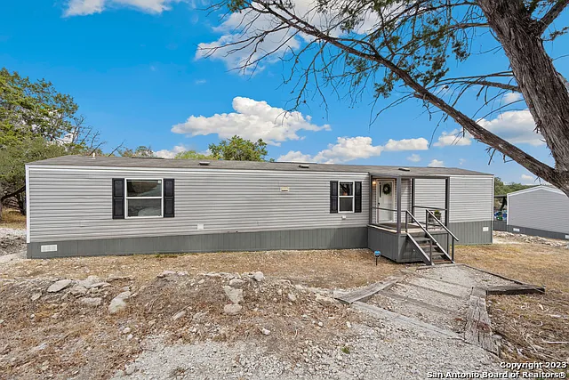 10450 Rebecca Creek Rd — Photo 2