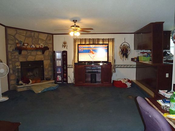 1/2 of living room with fireplace