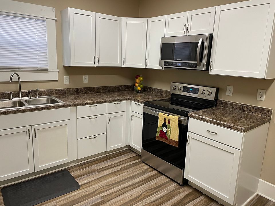 Large modern kitchen with stainless steel appliances