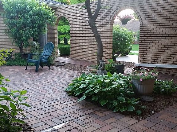 Courtyard
						:
						Tranguil and private sanctuary. Beautiful trees and perennials. Peach tree.