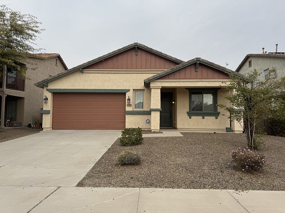 Freshly Painted Exterior in Vistancia 3 bedroom 2 bath with a Den. Pets welcomed!