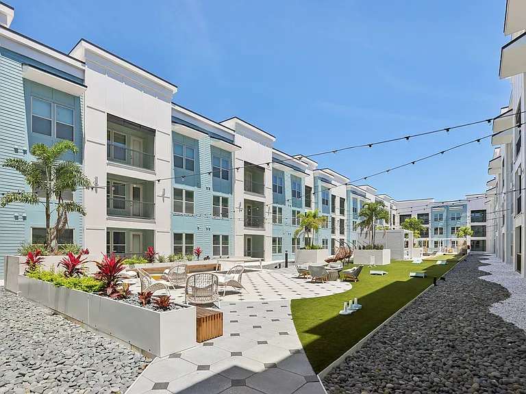 Social Deck with Grilling Stations, TVs, Cabanas, and Bocce Ball