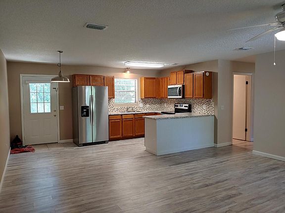 3rd image of 9275 W Sleepyoak Ct