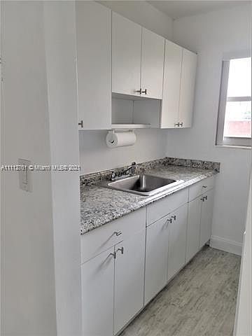 1st image of 1255 W 49th Pl #105
