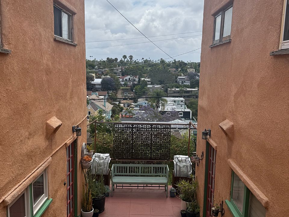 Down the stairs and the door on the left