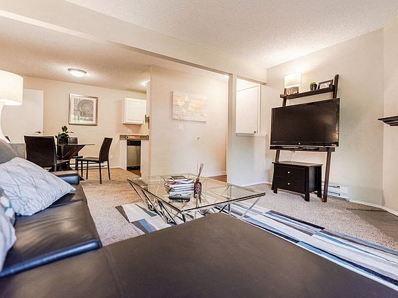 Everett Apartments - Tessera Apartments - Living Room, Dining Room, and Kitchen